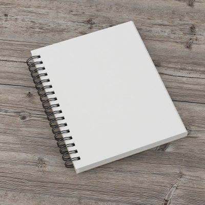 Wire-O binding that can be used on a hardcover or soft cover book. The spine is open, with no title on it, at Board books at Star Print Brokers.