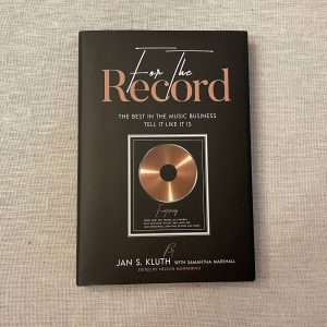 For the Record with a hardcover binding and a dust jacket. Beautiful custom books.